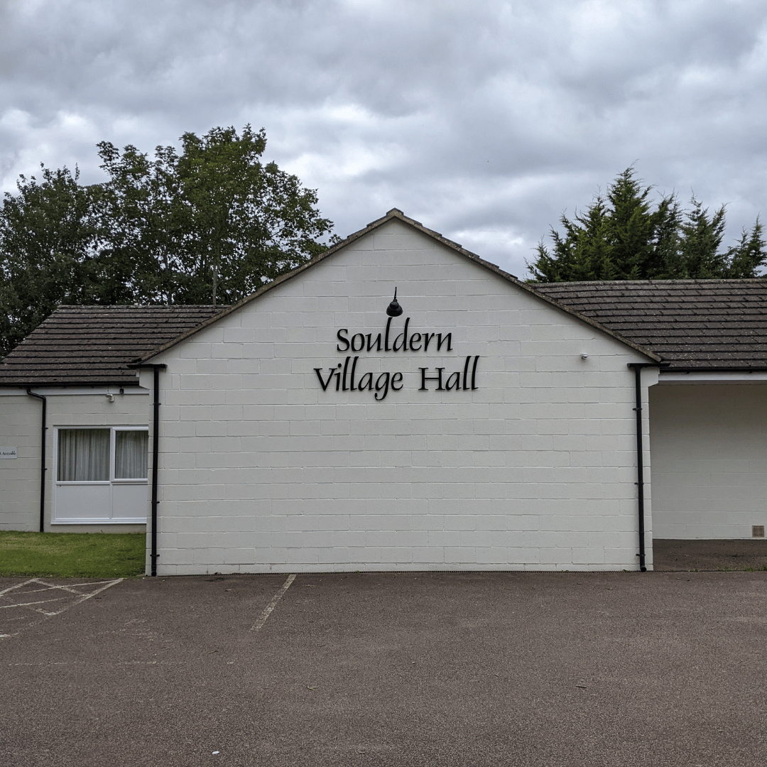 Exterior of Souldern Village Hall showing the hall sign