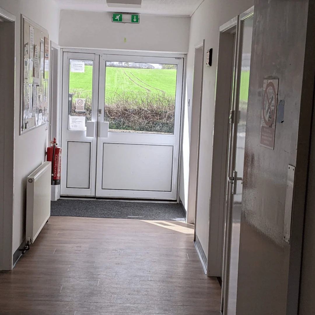 Corridor in Souldern Village Hall showing the back door
